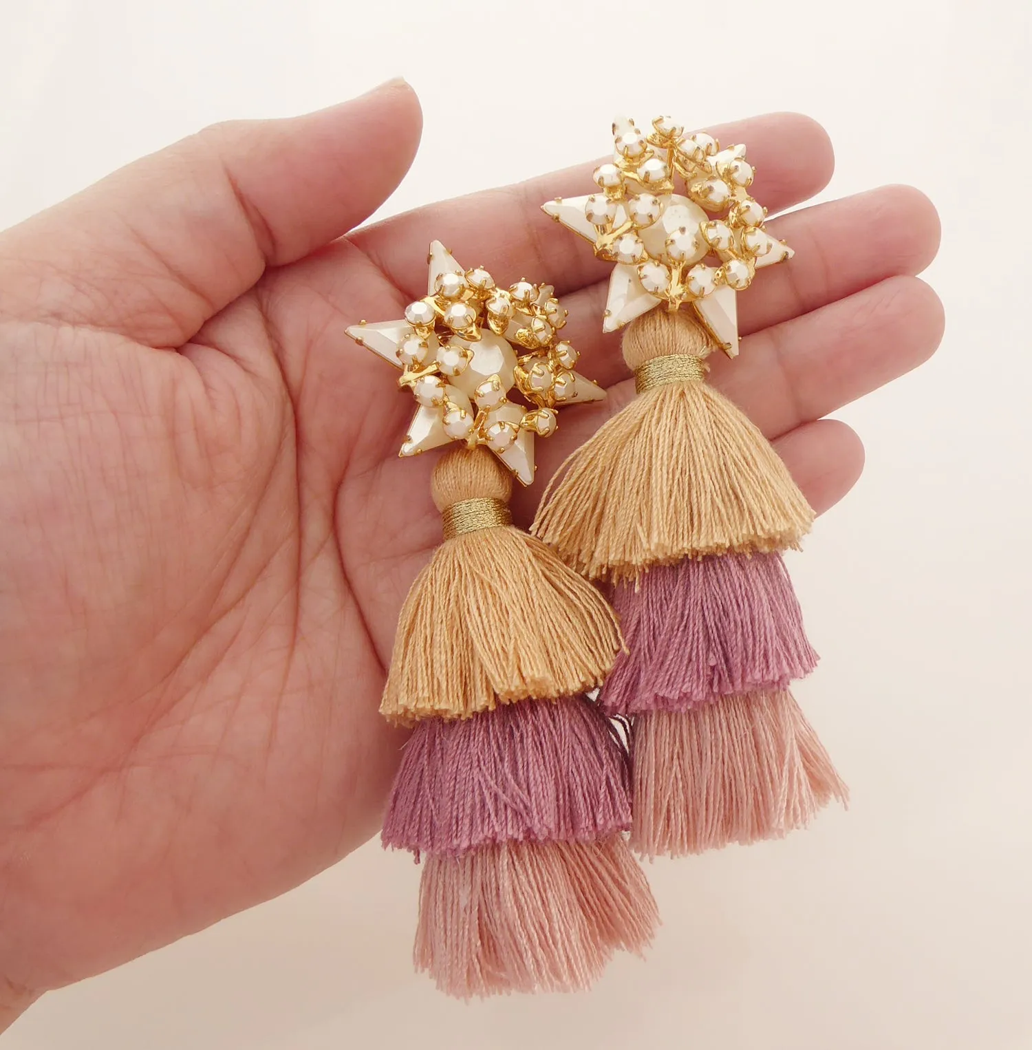 Pearly star and dusty rose tassel earrings
